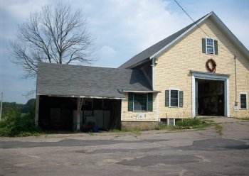 Existing front view of barn and carport