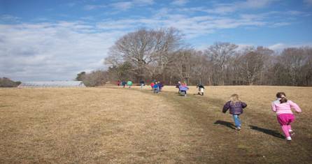 Kids running through the fields